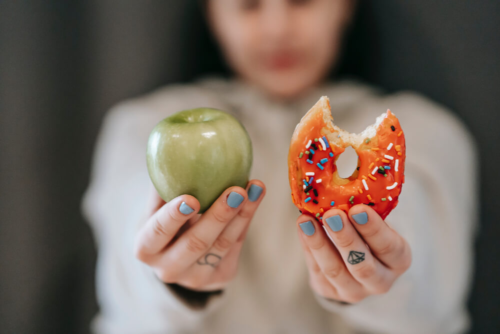 image-about-willpower-a-woman-ate-a-donut-instead-of-a-green-apple